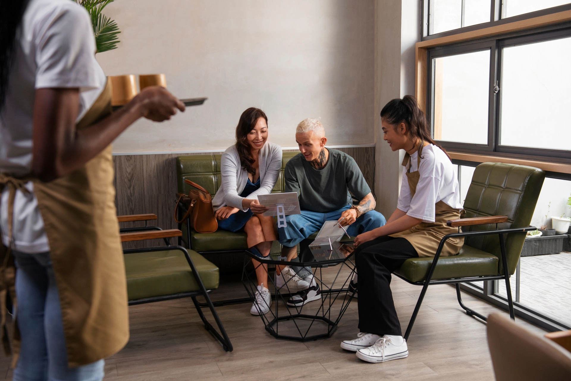 Behavioral health clients and staff in a welcoming group setting